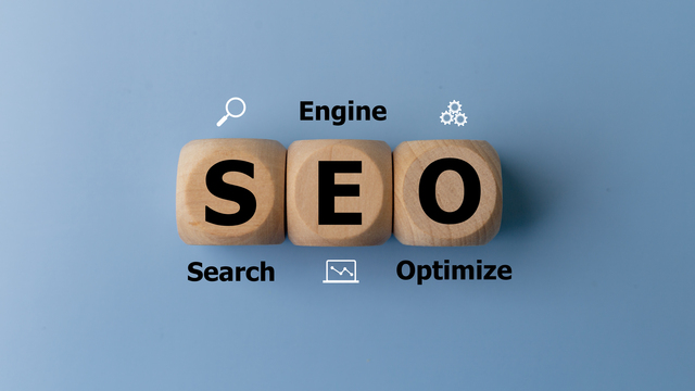 SEO Search Engine Optimization (SEO) on wooden cubes. Website In